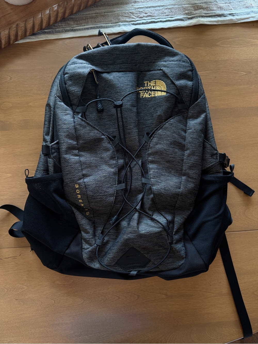 The North Face Borealis Backpack in Charcoal and Black with Gold Logo